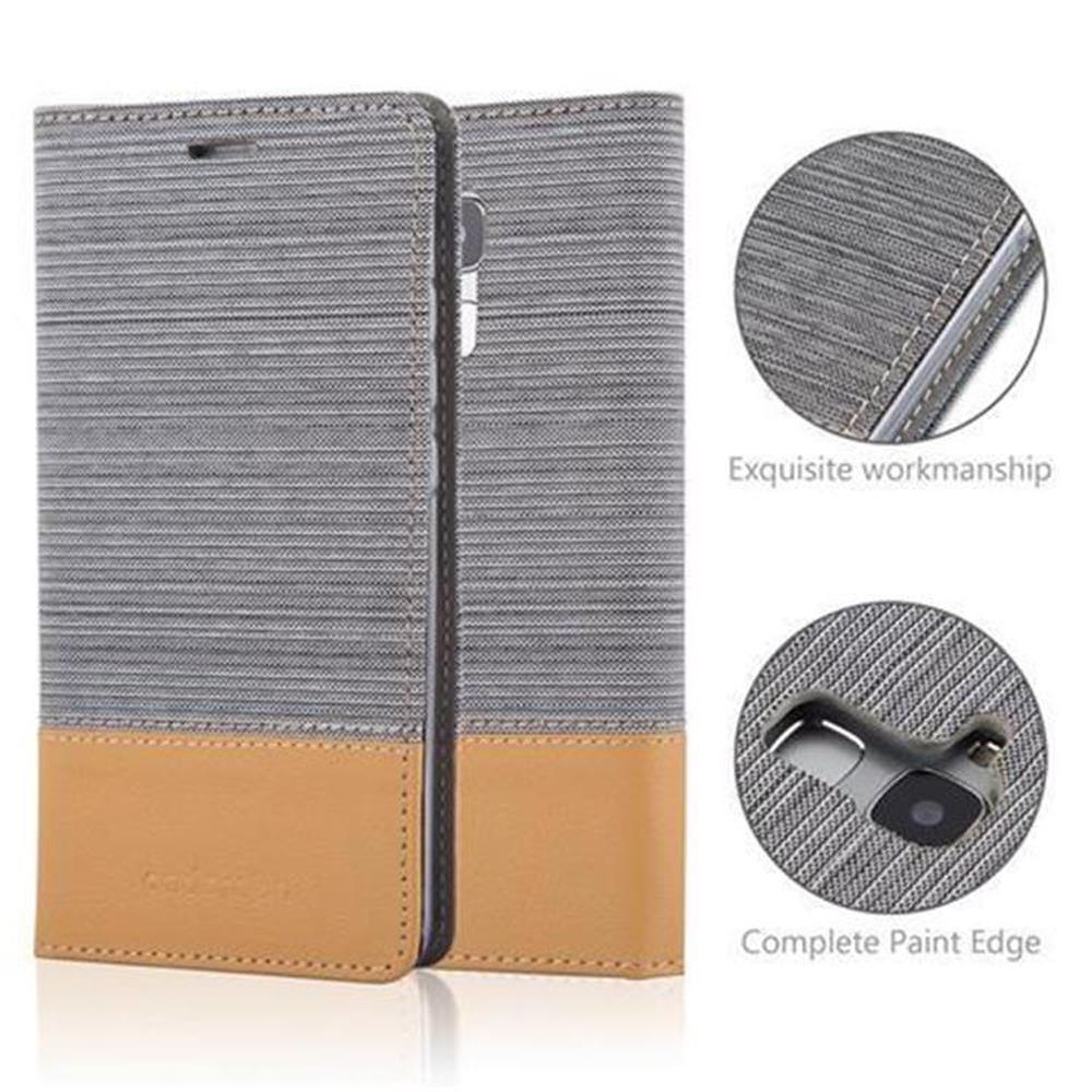 Una custodia per telefono con un design grigio e beige, che mostra l'area della fotocamera del telefono.