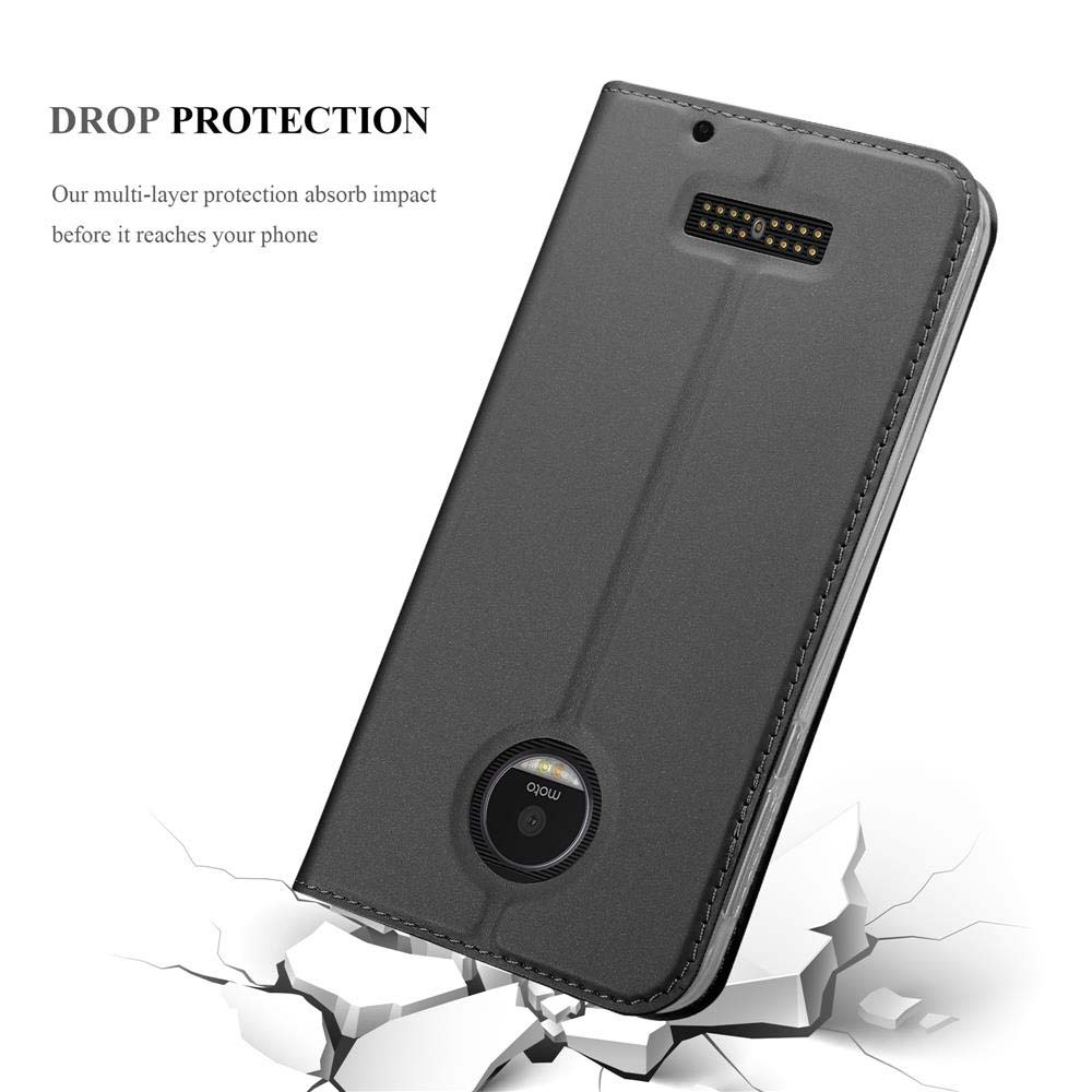 Custodia grigio scuro con telefono dentro. La custodia è su una superficie incrinata.