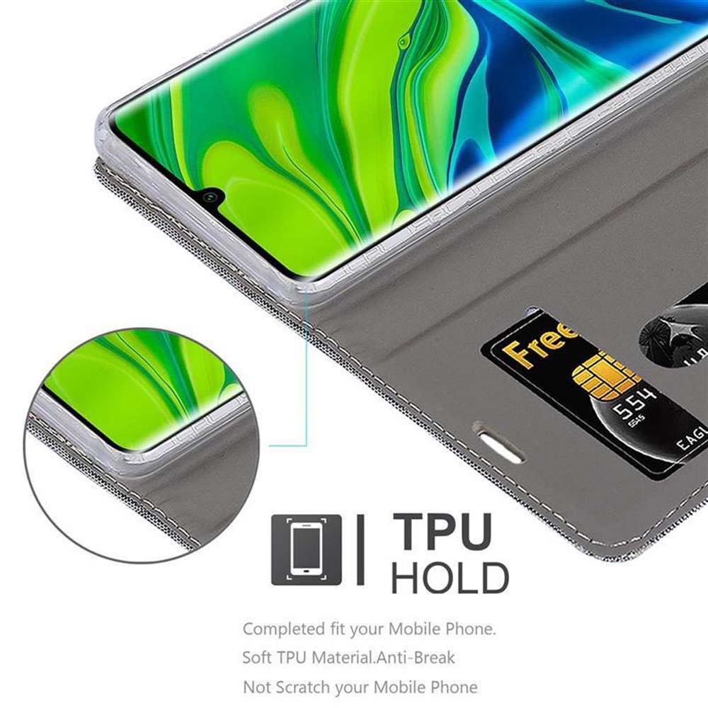 Eine graue Handyhülle mit einem Telefon darin. Das Telefon zeigt grüne und gelbe Grafiken und etwas Text an.
