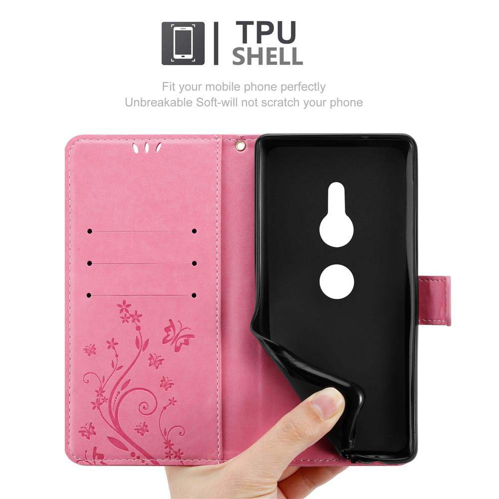Custodia rosa con telefono nero. Testo: TPU SHELL.