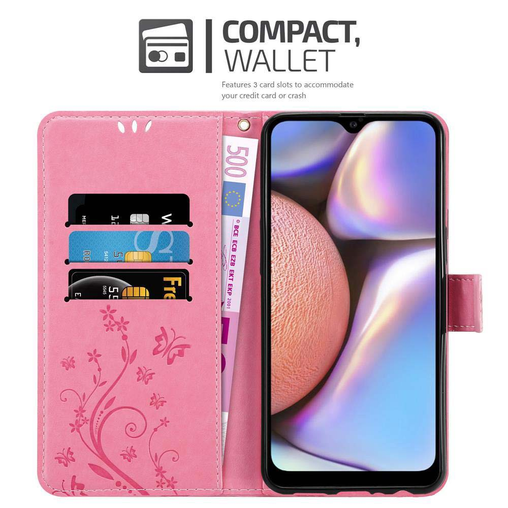 Custodia a portafoglio rosa con scomparti per carte, carte e denaro. Telefono a destra.