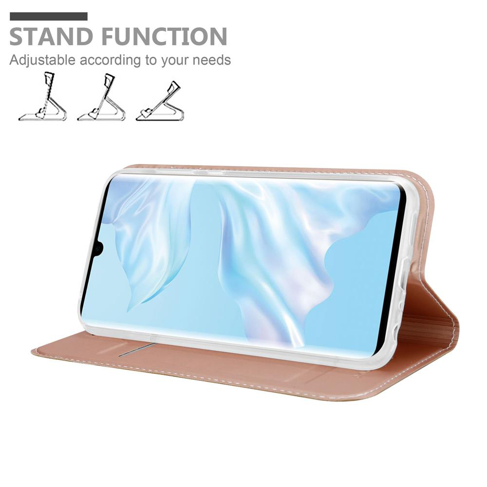 Ein Telefon in einem Gehäuse ist aufgestellt. Text: STANDFUNKTION.