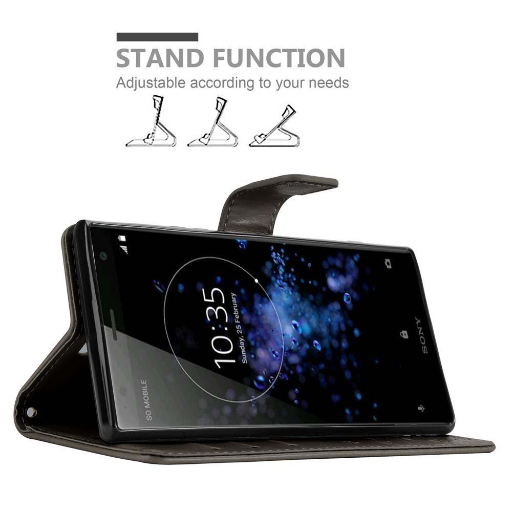 Un telefono in una custodia marrone con funzione stand. L'ora 10:35 è visualizzata sullo schermo.