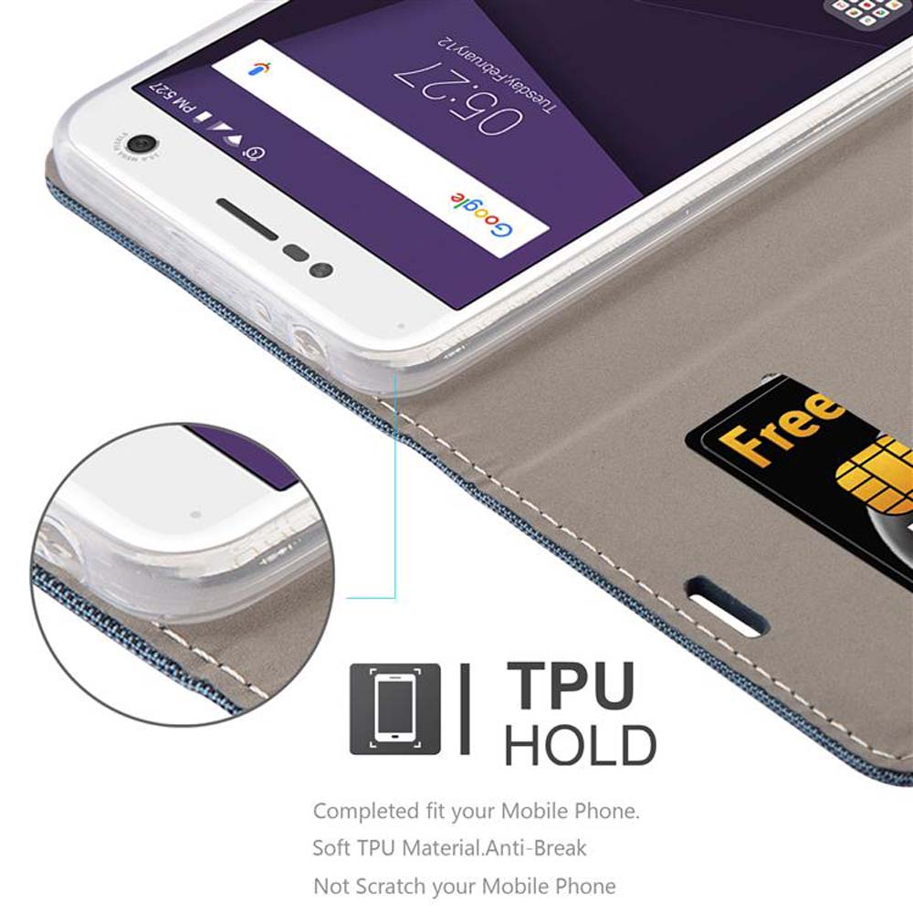 Telefono in una custodia a portafoglio. Una carta con Free è nella custodia. Testo: TPU HOLD.