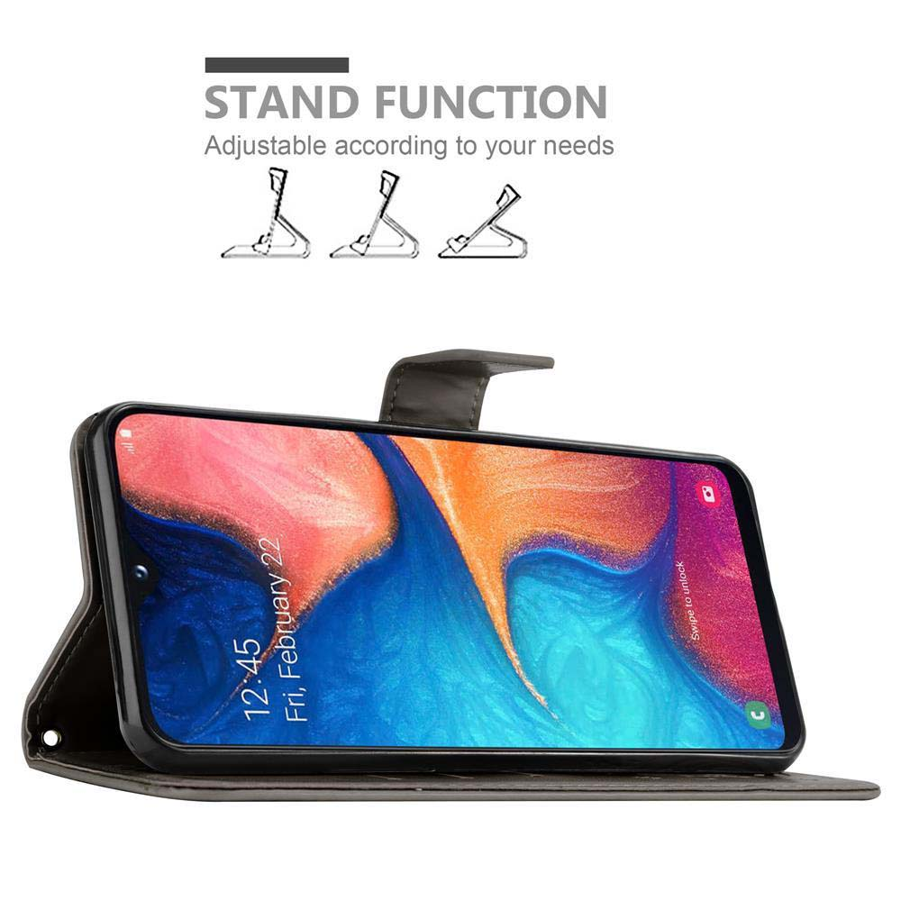 Telefono in una custodia a portafoglio, puntellato. Testo: Funzione di supporto.