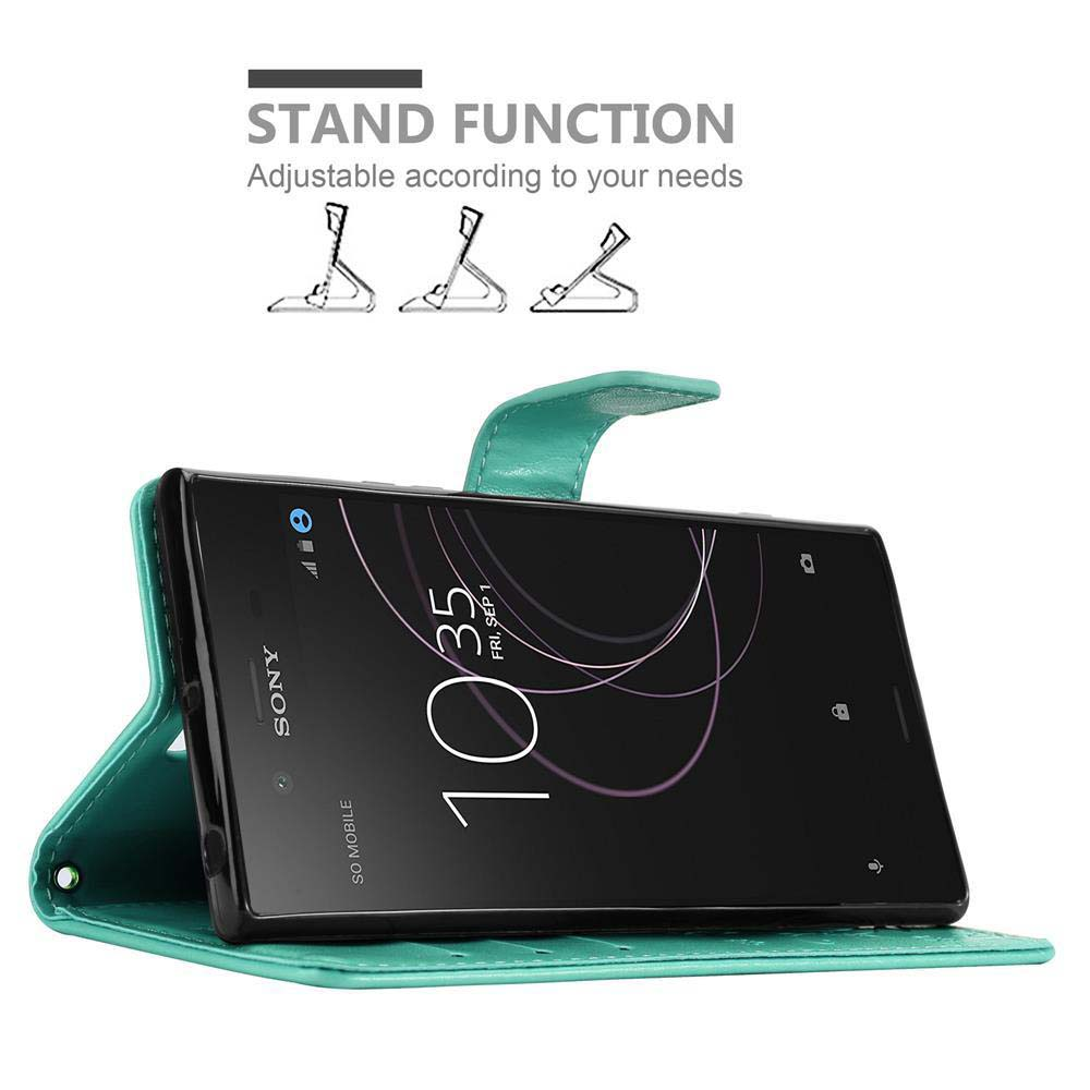 Un telefono in una custodia verde acqua in modalità stand con la funzione stand visibile. Lo schermo mostra l'ora e la data.