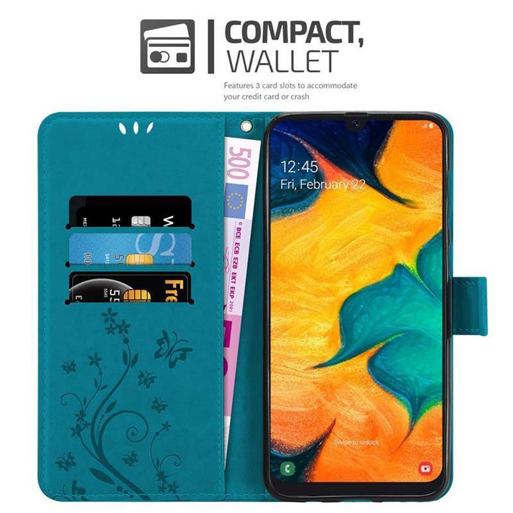 Custodia a portafoglio blu con telefono, carte e denaro, con design floreale.