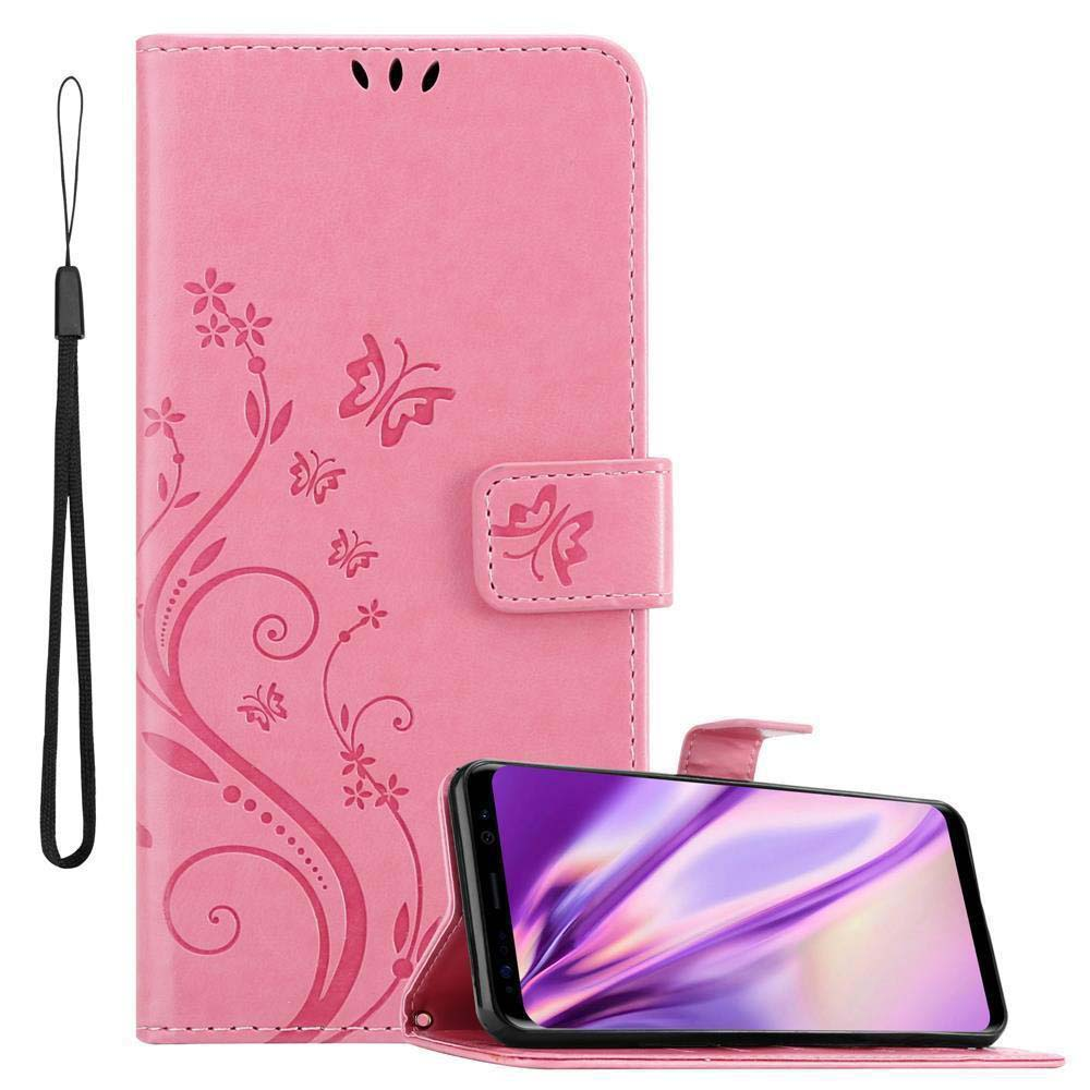 Custodia per telefono rosa con design floreale e cinturino. Il telefono è all'interno, aperto. La custodia è rosa.