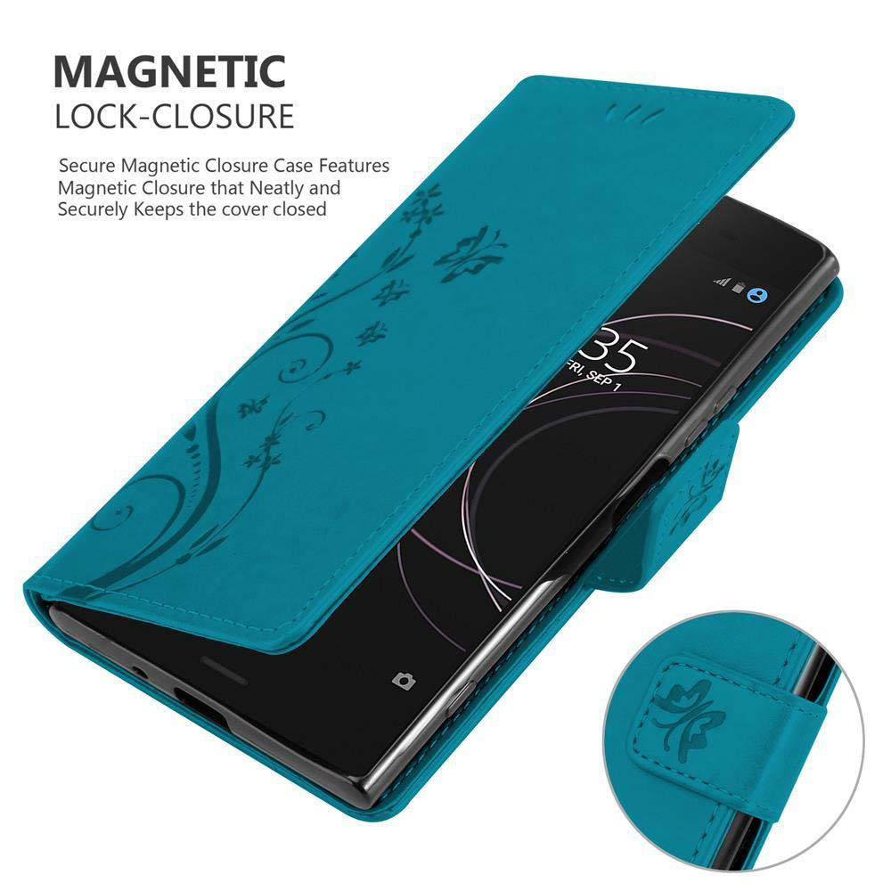 Una custodia per telefono color verde acqua con un telefono all'interno. La custodia è aperta, mostrando un design floreale e una chiusura magnetica.