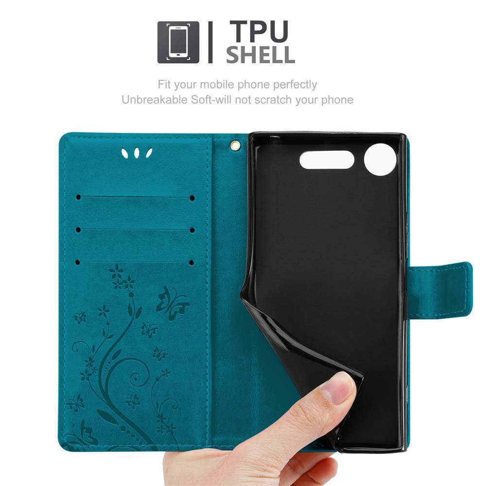 Custodia del telefono verde acqua, aperta, che mostra uno slot per telefono e un design floreale all'interno.
