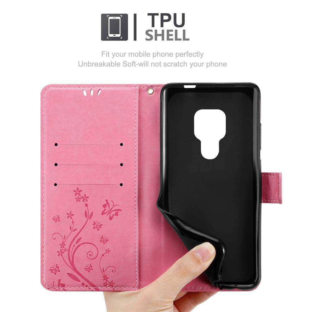 Custodia per telefono rosa aperta, che rivela una custodia per telefono nera, con una mano che la tiene. Sfondo bianco.