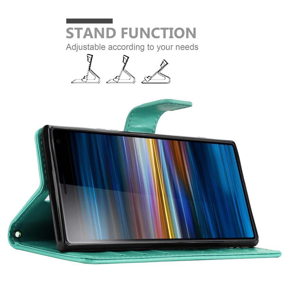 Un telefono in una custodia verde acqua, appoggiato. Lo schermo mostra un'immagine blu. La custodia è aperta.