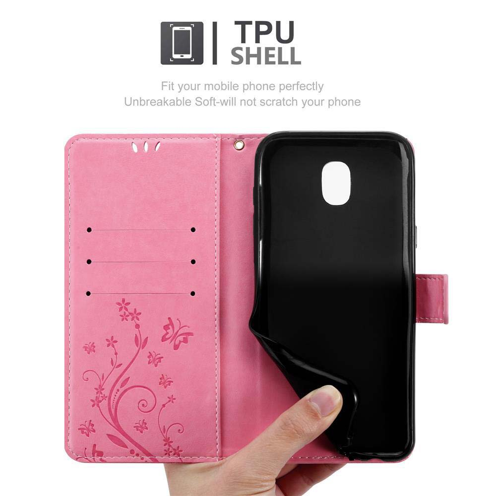 Una custodia rosa per telefono con un telefono all'interno. Ha un design floreale ed è aperta.