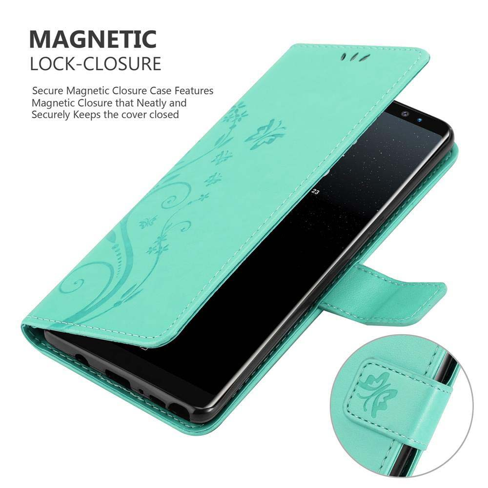 Custodia per telefono color verde acqua con design floreale e chiusura magnetica. Smartphone visibile all'interno. Sfondo bianco.