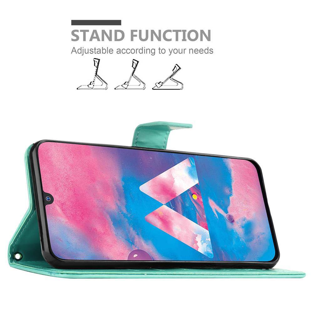 Custodia verde per telefono con un telefono all'interno. Il telefono mostra un design astratto colorato.