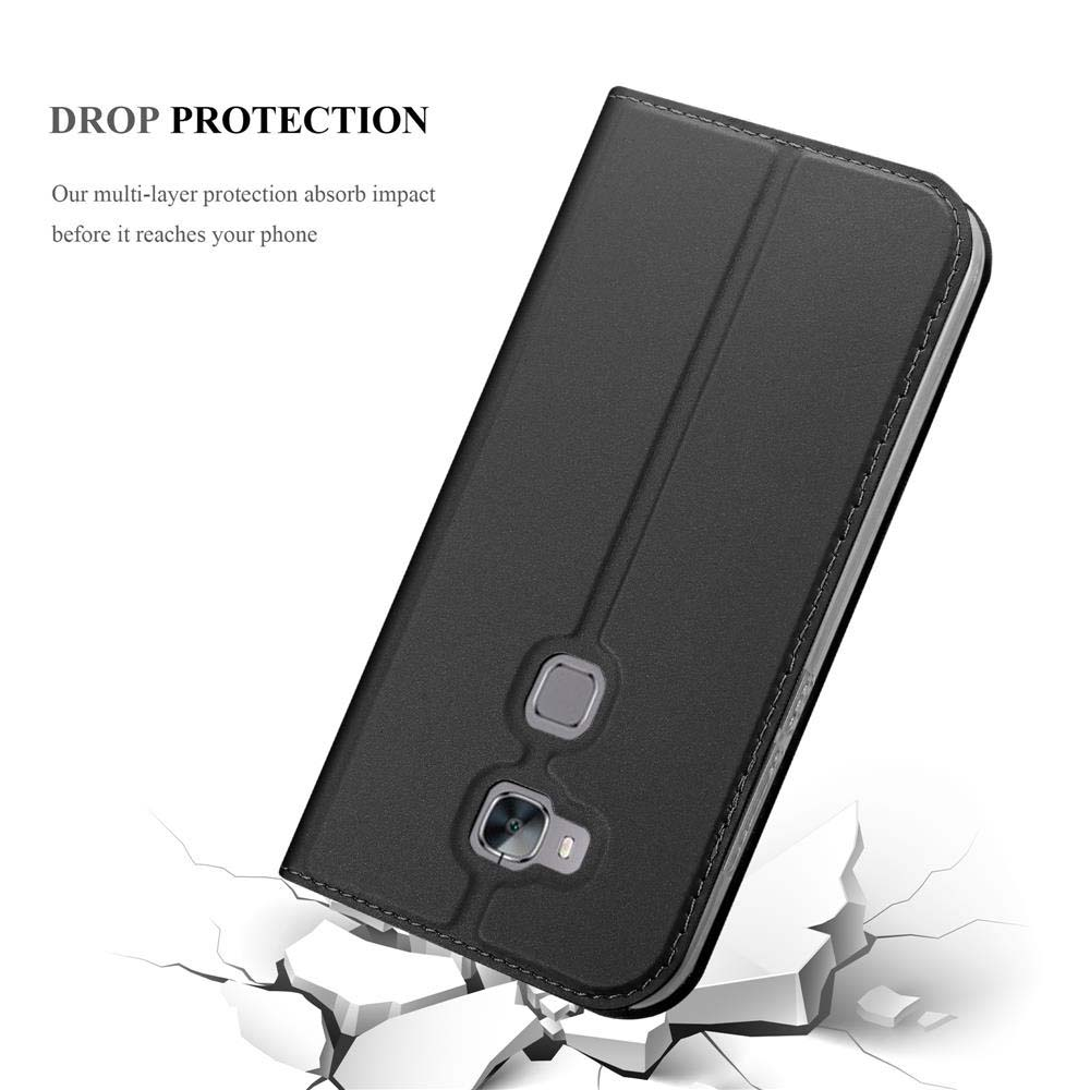 Funda de teléfono negra, cerrada, con grietas que implican protección contra caídas, sobre fondo blanco.