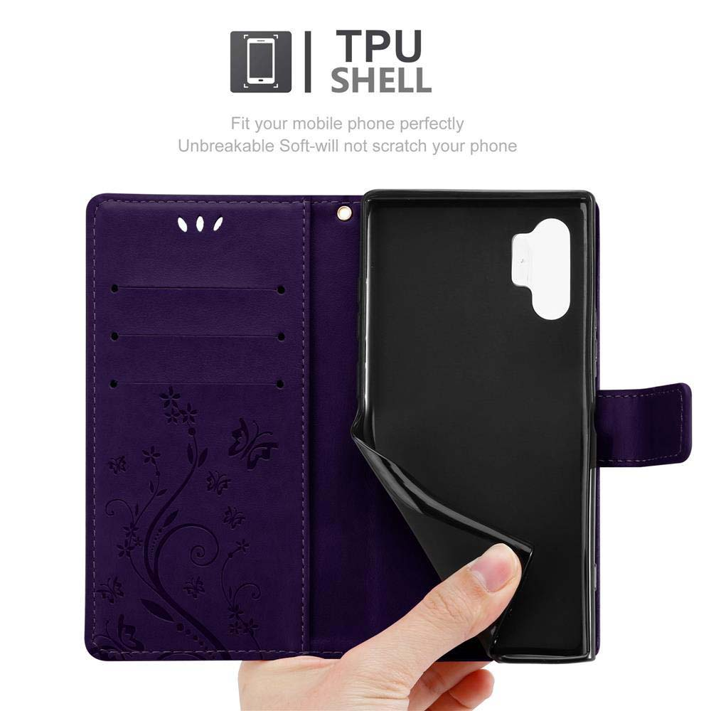Custodia viola per telefono, interno con design a farfalla. Telefono all'interno.