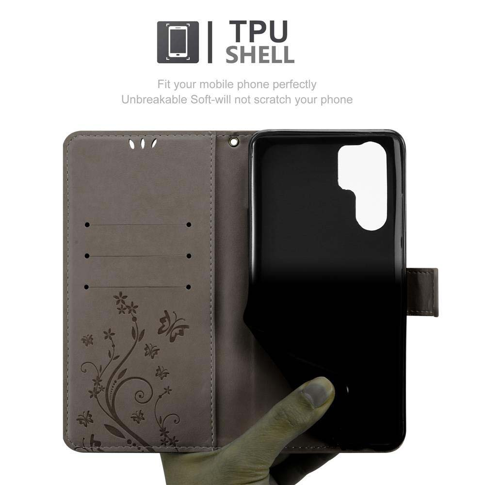 Custodia per telefono aperta con telefono all'interno. La custodia ha un design floreale e una chiusura magnetica.