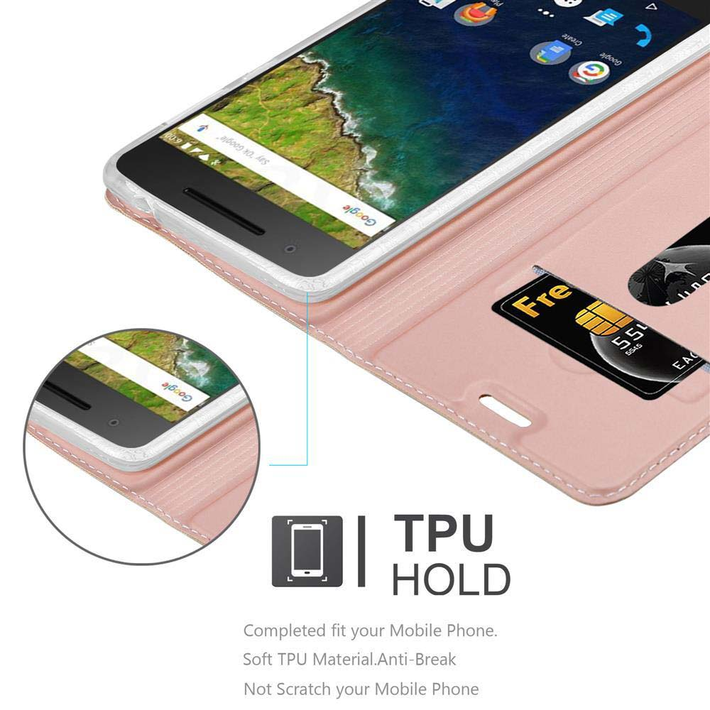 Ein Telefon mit einer Kreditkarte im Etui. Der Bildschirm zeigt eine Google-Suche. Der Koffer ist rosa.