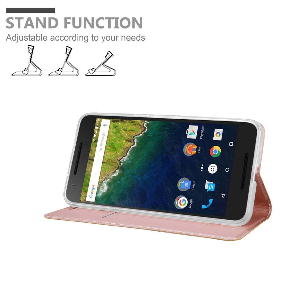 Eine pinke Handyhülle mit einem Telefon darin, das sich in der Standfunktion befindet. Das Telefon zeigt Google-Apps.