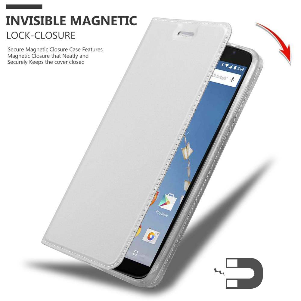 Se abre una funda blanca, revelando un teléfono. Se muestra un imán. Cierre magnético invisible.