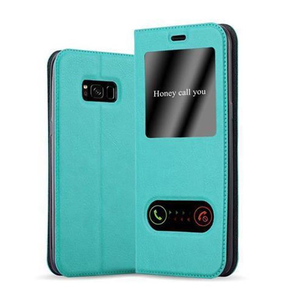 Una funda de teléfono turquesa está abierta, mostrando una pantalla con las palabras "Honey call you".