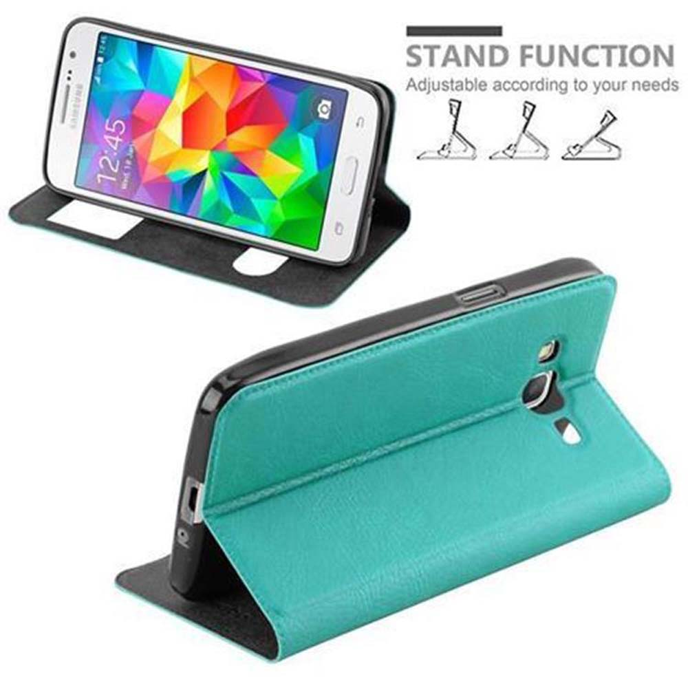 Un teléfono en una funda color turquesa, abierto para mostrar la pantalla y un diagrama.