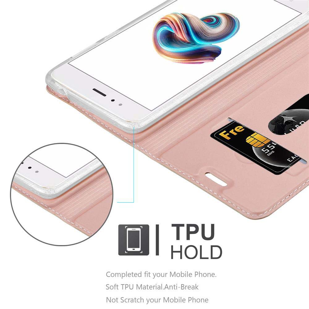 Custodia per telefono rosa, aperta, con un telefono dentro e una carta di credito. TPU HOLD è scritto sotto. Materiale TPU morbido.