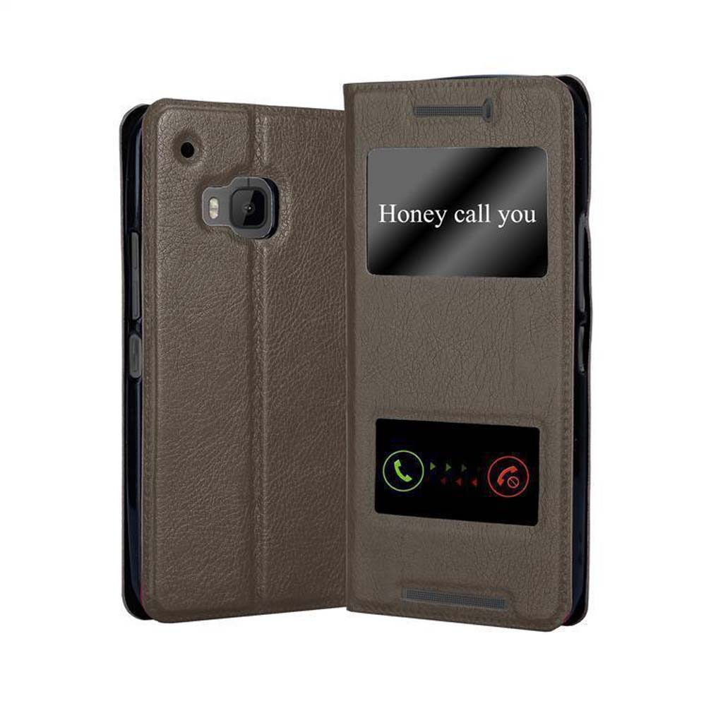 Funda de teléfono marrón, abierta. Pantalla dice "Honey call you". Iconos verde y rojo. Fondo blanco.