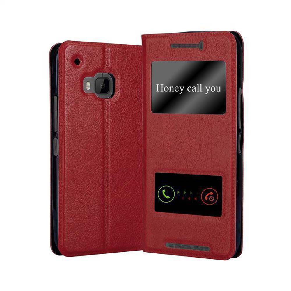 Una funda roja abierta, mostrando 'Honey call you' y botones de llamada. El teléfono es visible.