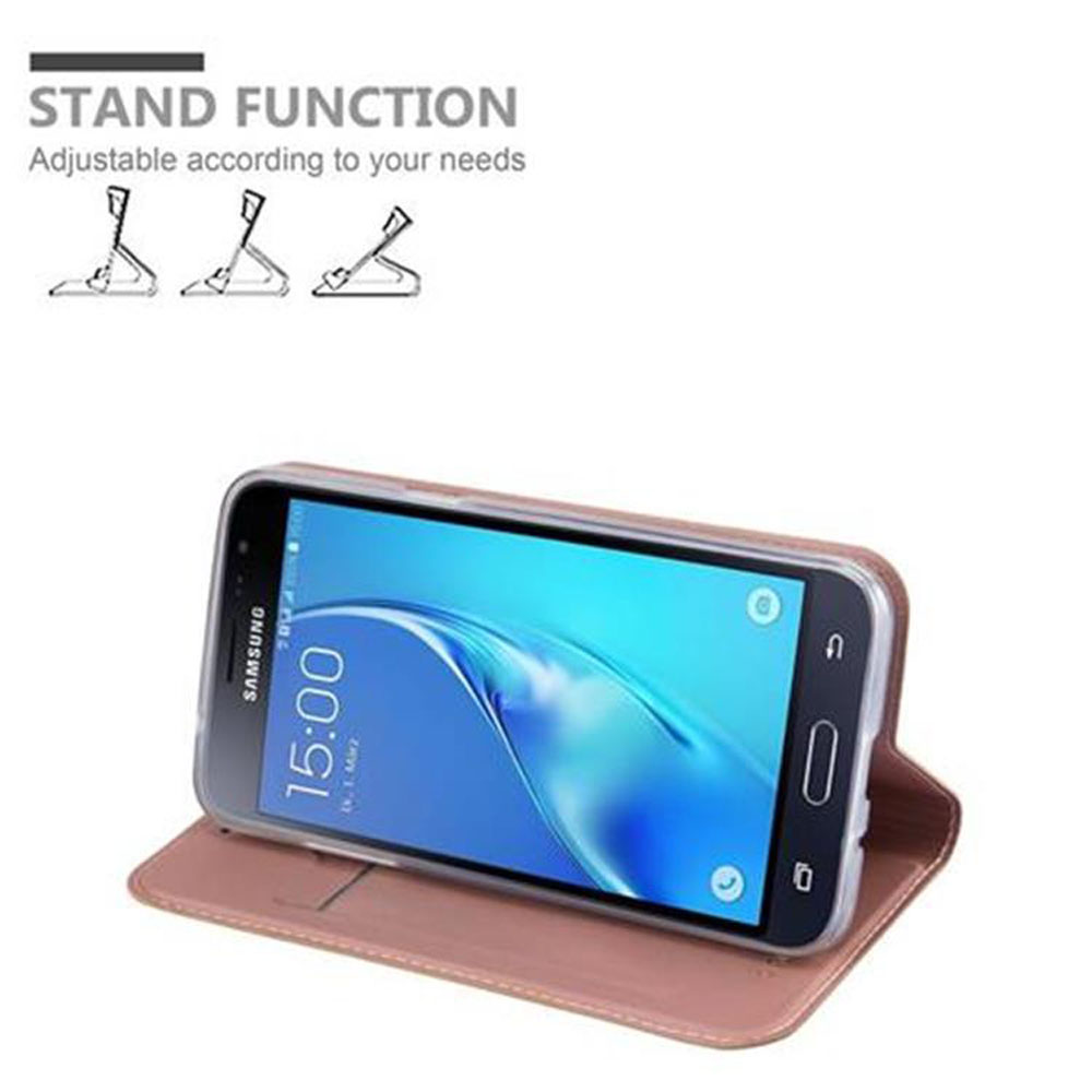 Telefon in einem pinken Ständer-Etui. Text 'STAND FUNCTION'.