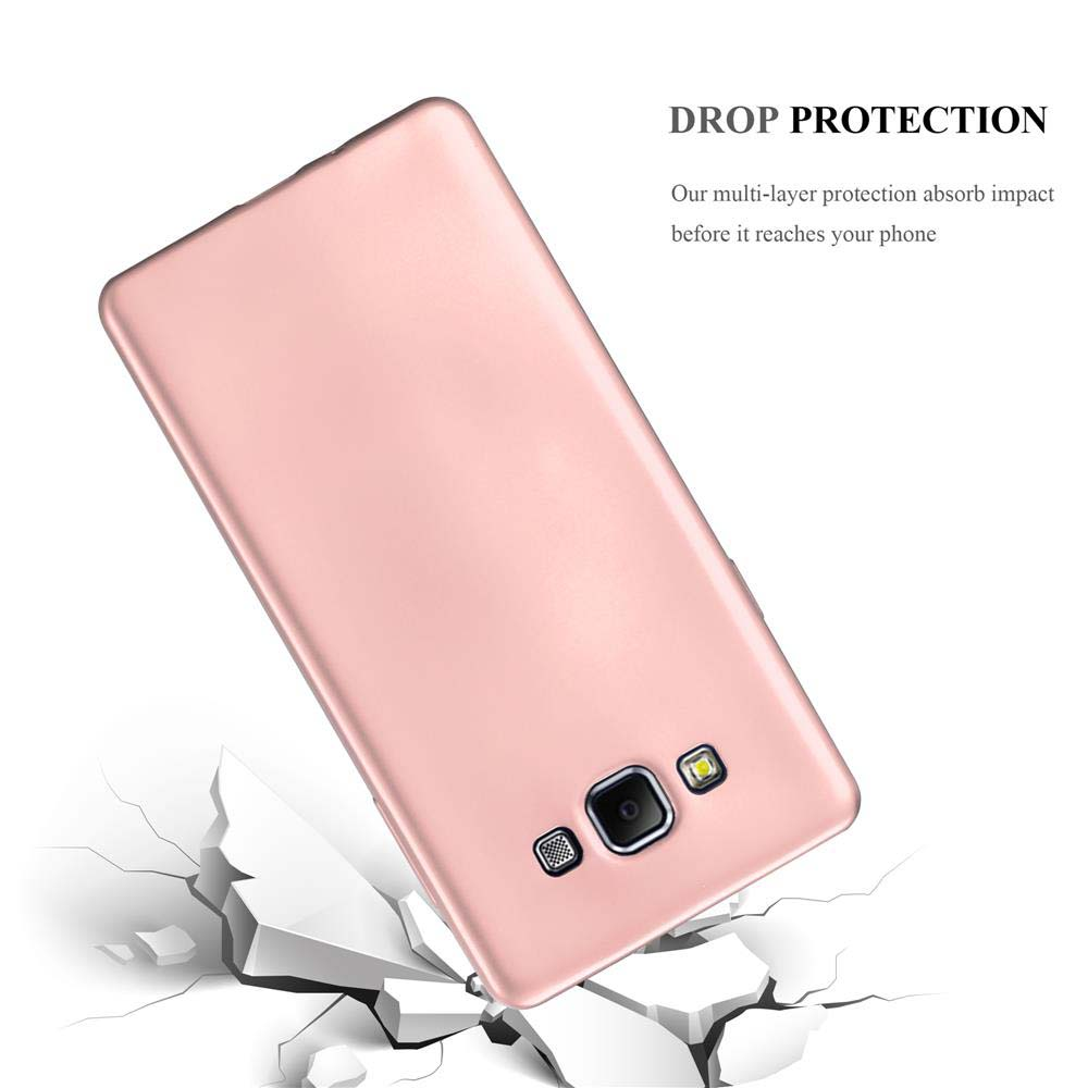 Funda rosa para teléfono, caída sobre una superficie agrietada. Protección contra caídas.
