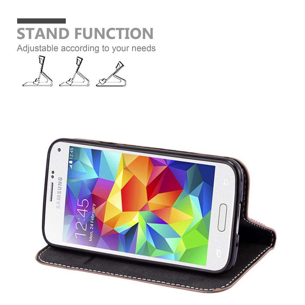 Un telefono con schermo colorato in una custodia nera, con icone della funzione stand. Sfondo bianco.