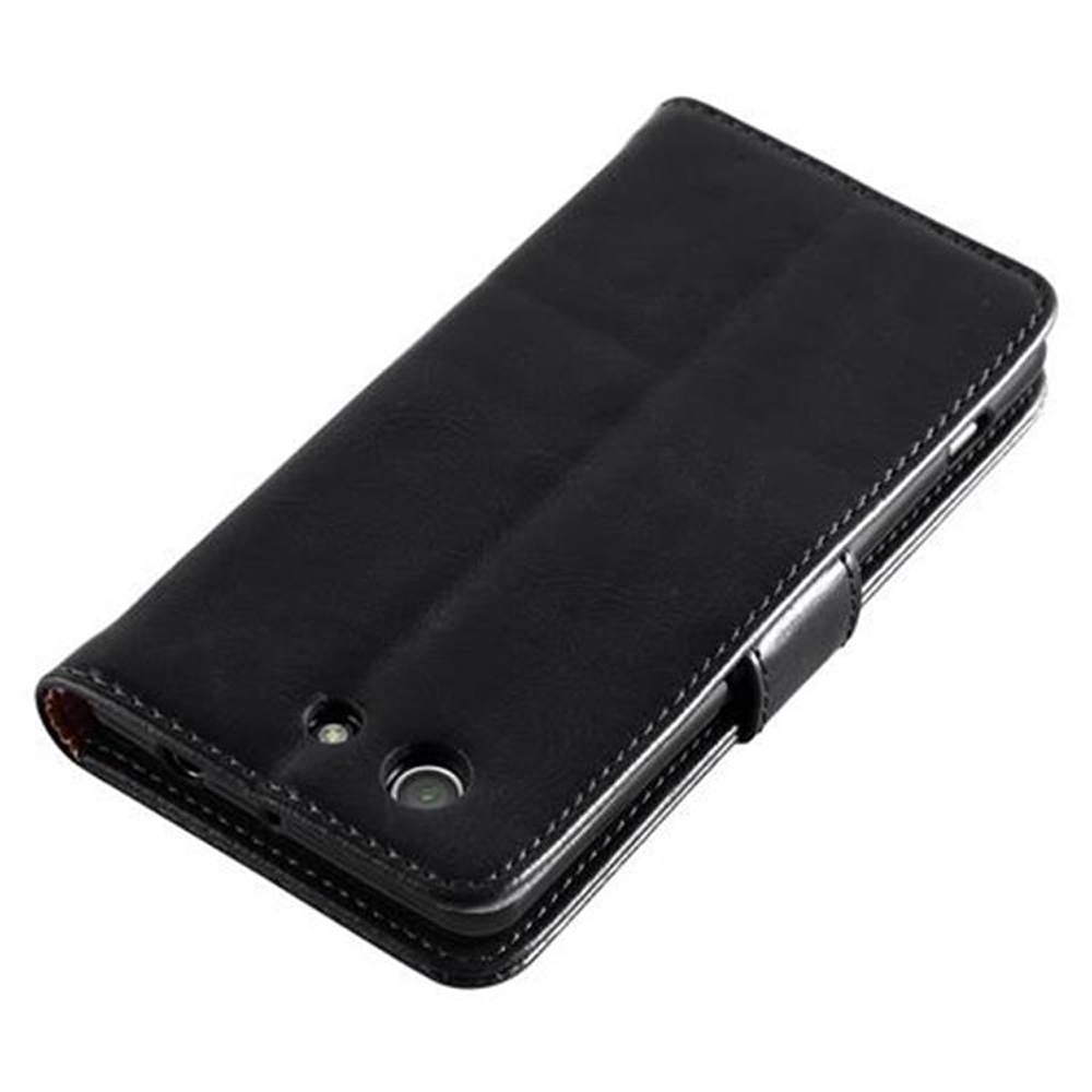 Una funda negra para teléfono con cierre magnético sobre un fondo blanco. Muestra el interior y el exterior de la funda.