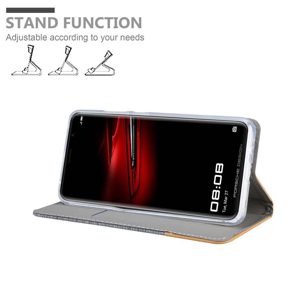 Telefon in einem Case, aufgestellt. Text: 'STANDFUNKTION'. Der Bildschirm zeigt die Uhrzeit.