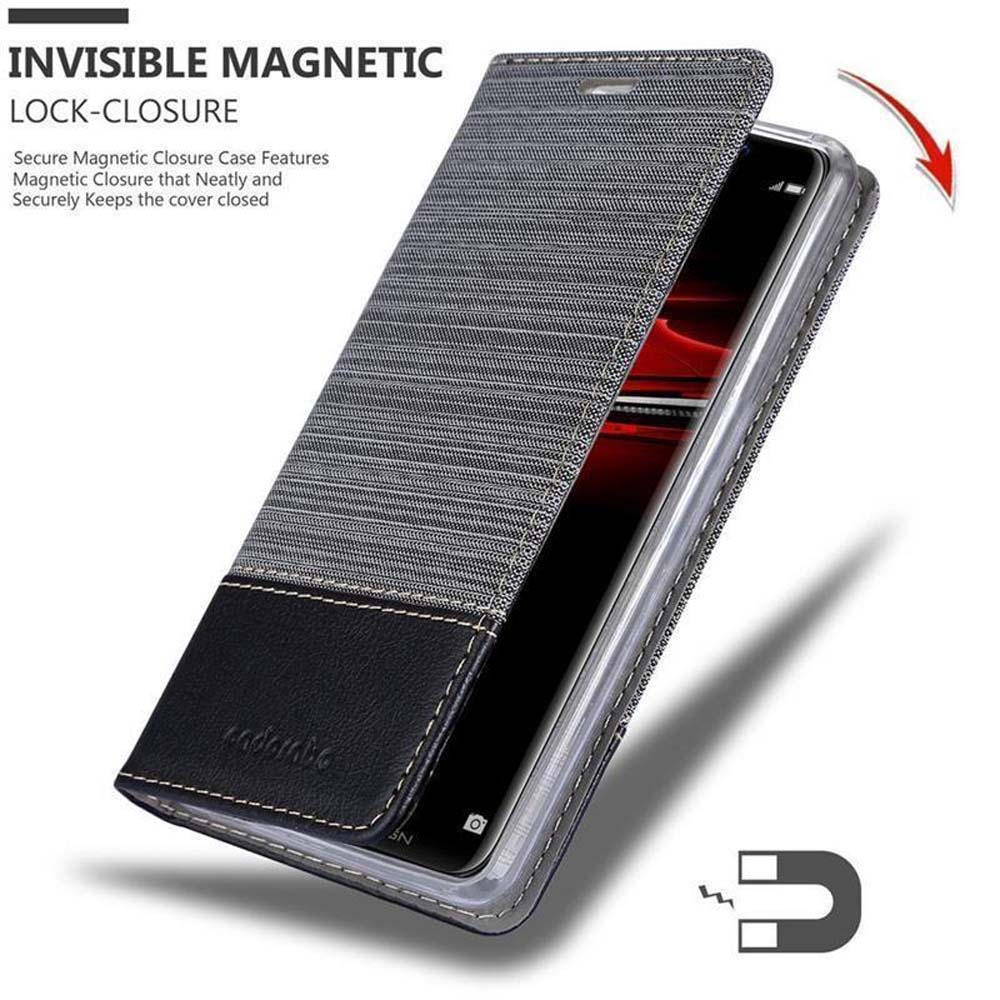 Eine Handyhülle in grauem und schwarzem Design. Sie ist geöffnet und zeigt ein Telefon darin.