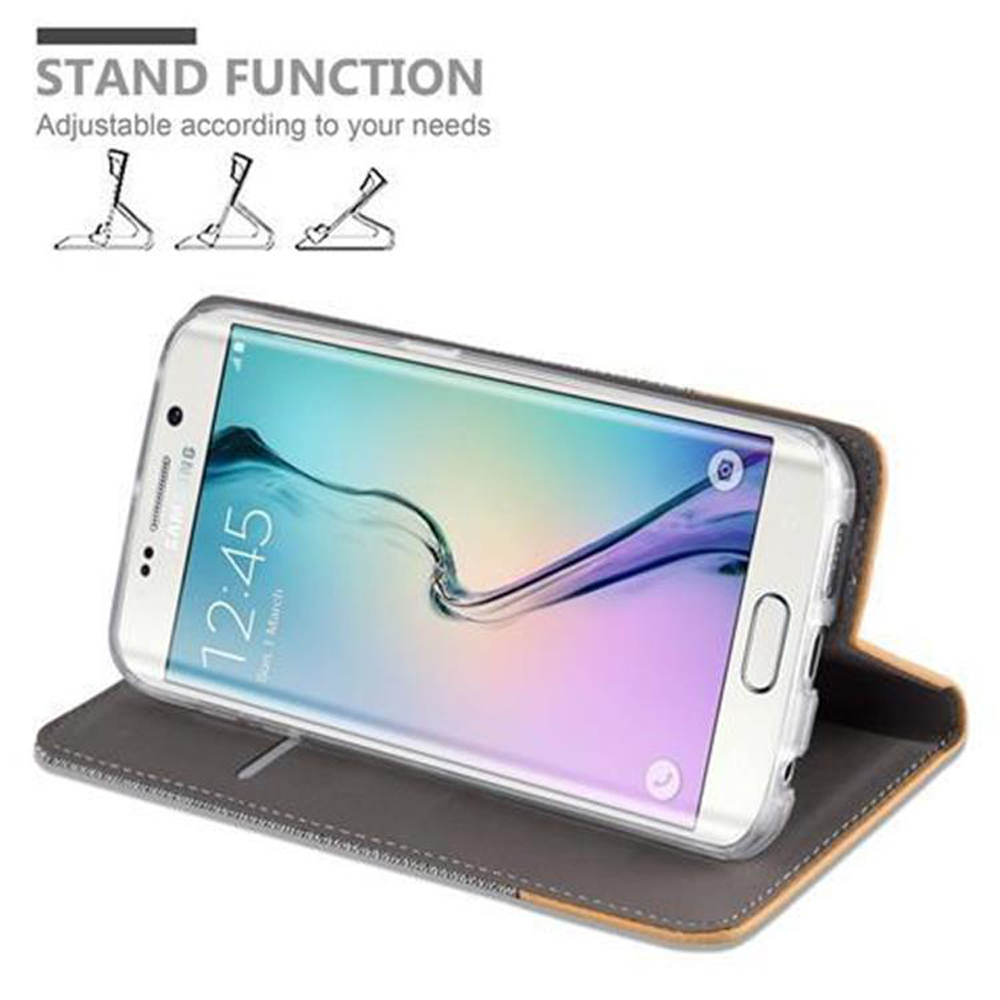Telefon auf einer Standhülle. Das Telefon ist weiß. Die Standfunktion ist einstellbar. Das Telefon zeigt einen Bildschirm.
