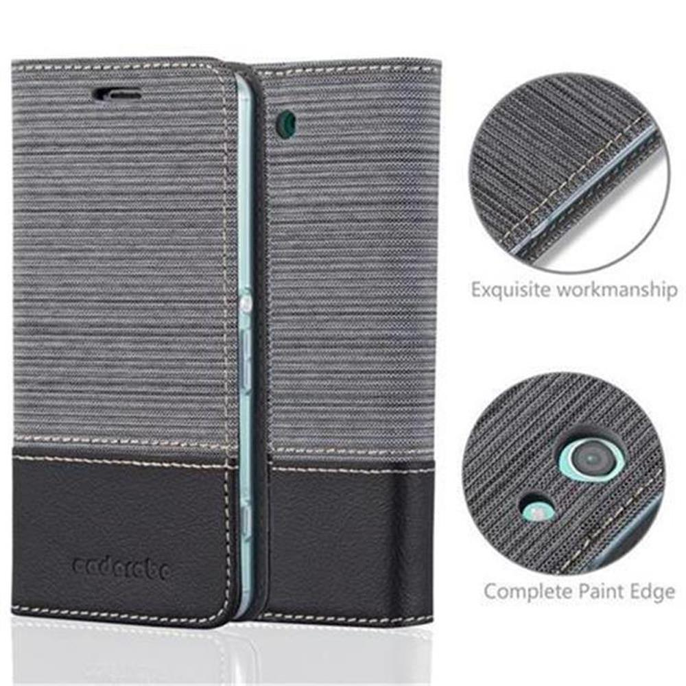 Funda de teléfono gris con negro. Texto: exquisita mano de obra.