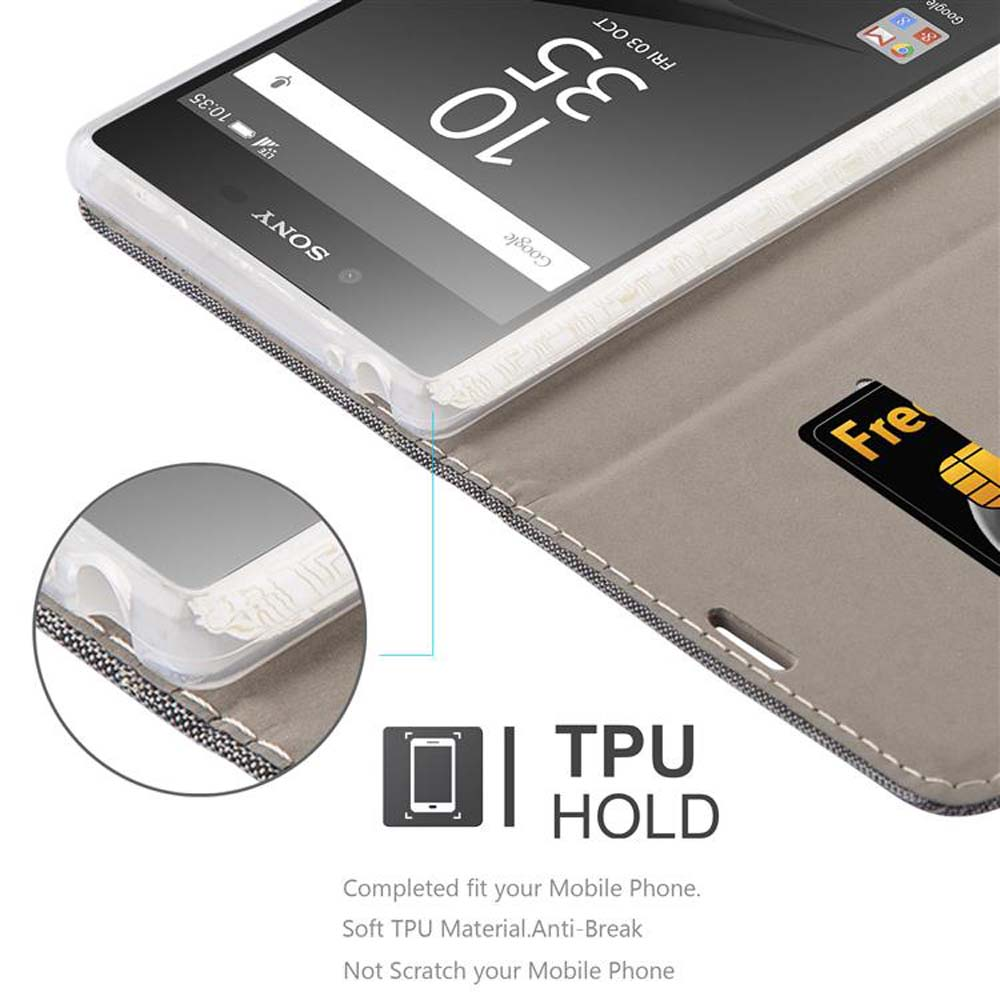 Telefono in una custodia con carta di credito. Il testo recita 'TPU HOLD'. Lo sfondo è bianco.