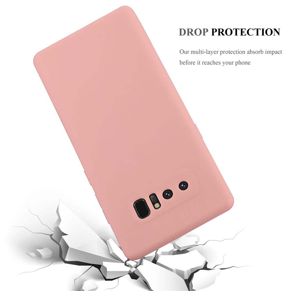 Una custodia rosa per telefono che cade su una superficie, rompendola. C'è un telefono sul retro. La custodia ha protezione dalle cadute.