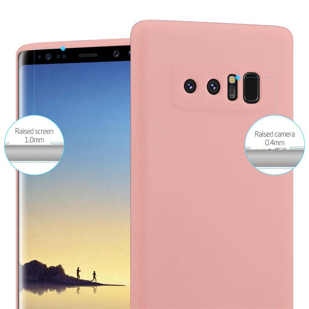 Telefono rosa con custodia. Lo schermo è visibile, con una vista di un paesaggio con due figure.