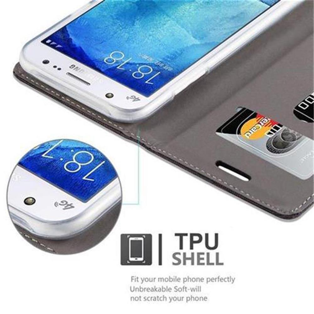Eine Handyhülle mit einem Telefon darin. Die Hülle hat Schlitze für Karten.