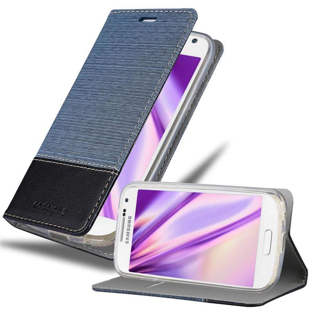 Funda de teléfono abierta, teléfono visible. Tapa azul con cubierta negra y gris. Dice "SAMSUNG".