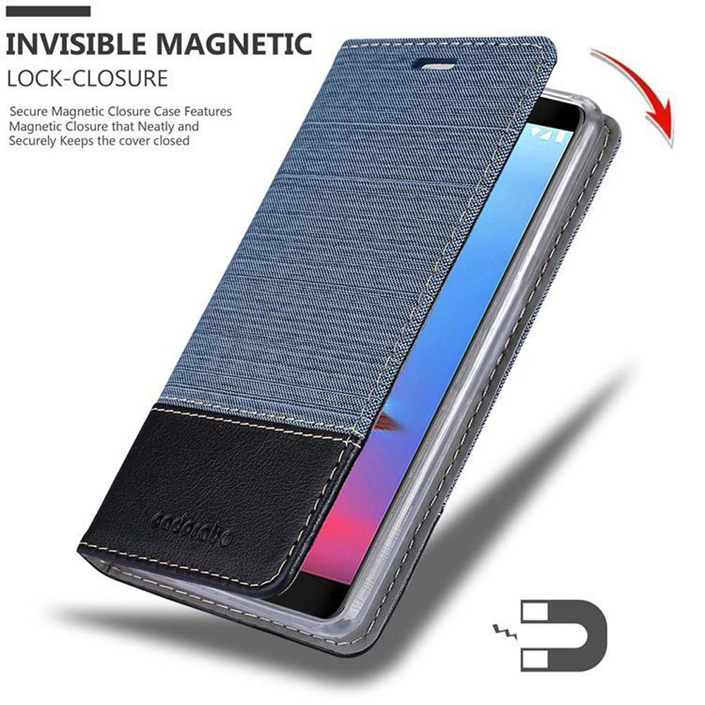 Custodia per telefono in denim con chiusura magnetica. Viene mostrato anche un magnete. Sfondo bianco.