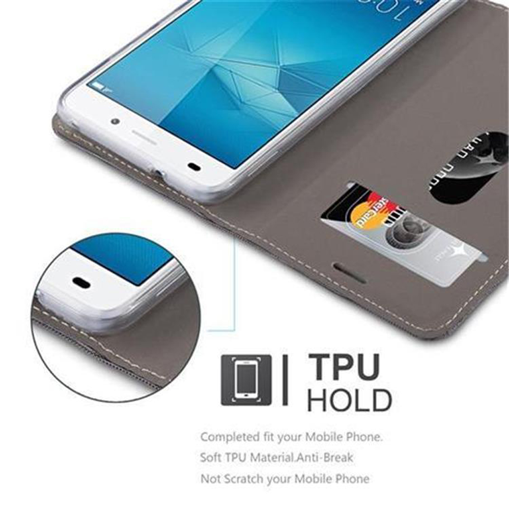 Un telefono è appoggiato in una custodia grigia, mostrando lo schermo e una carta di credito. TPU HOLD è indicato sotto.