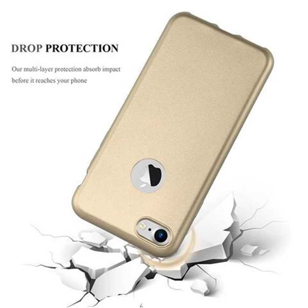 Custodia dorata per telefono, con un telefono all'interno, si sta rompendo a terra, mostrando la protezione dalle cadute.