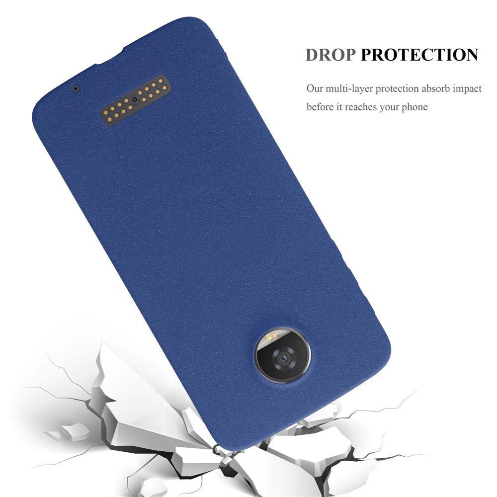Funda de teléfono azul cayendo, rompiendo una superficie. Texto: Protección contra caídas. Absorbe el impacto.