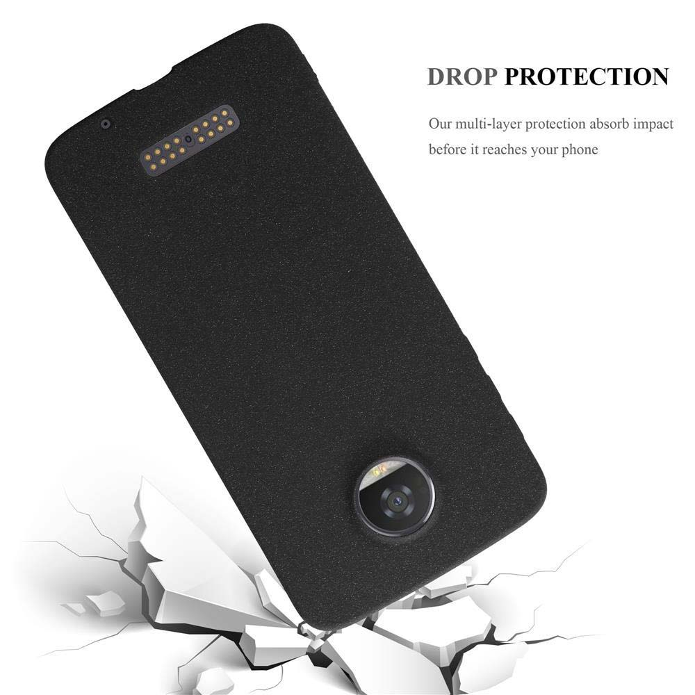 Funda negra para teléfono, con agujero para la cámara y un teléfono rompiendo el suelo.