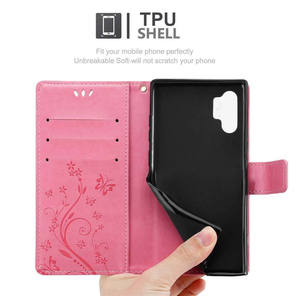 Custodia per telefono rosa con un design a farfalla. L'interno è nero. Sfondo: Bianco.