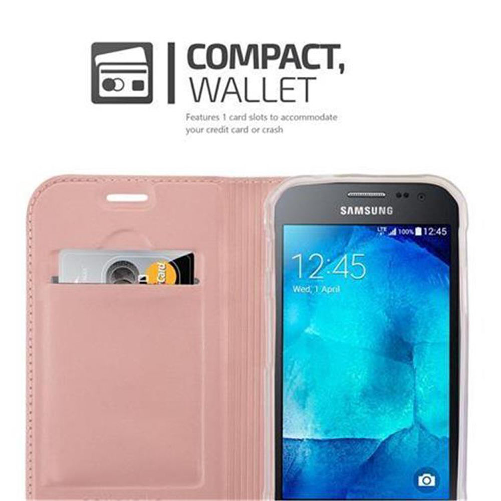 Custodia a libro rosa aperta, che mostra fessure per carte di credito e schermo del telefono. Testo: 'COMPACT, WALLET'.